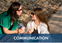 mom and teen talking on park bench