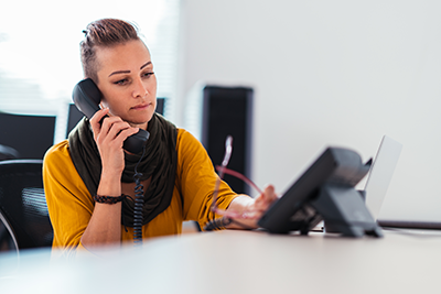 woman answering phone