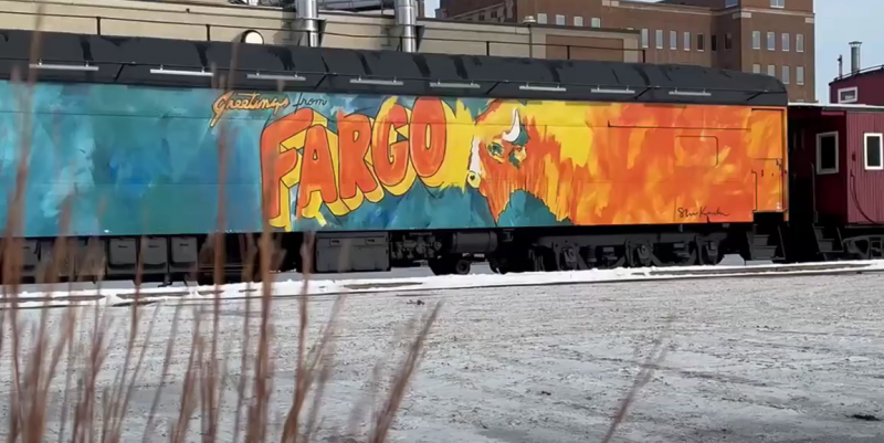 train with graffiti that says Fargo