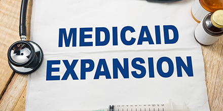 A graphic images with text Medicaid Expansion.