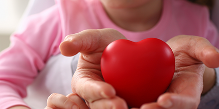 hands holding heart shape