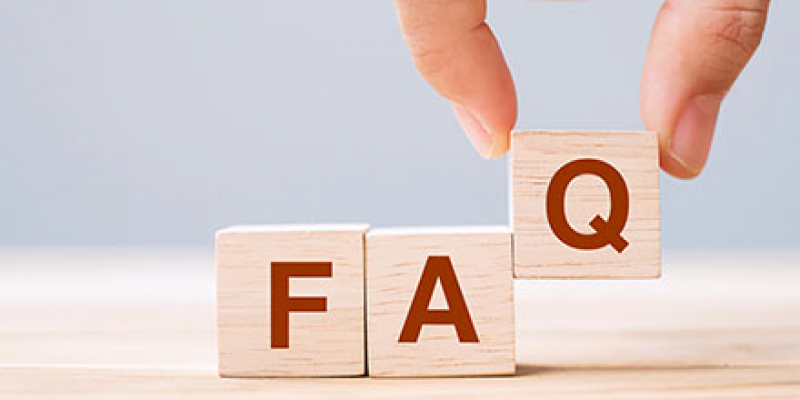 wood blocks spelling F, A and Q for frequently asked questions